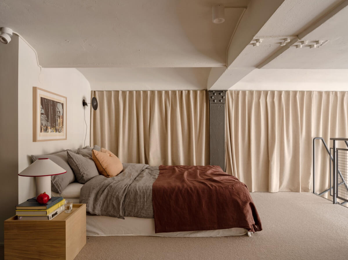 A Monochrome Loft with High Ceilings and Art 34 loft bedroom curtain wall
