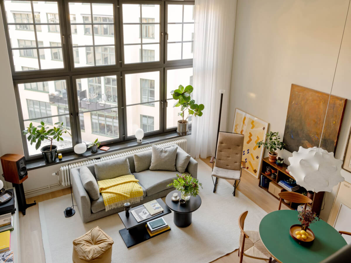 A Monochrome Loft with High Ceilings and Art 11 loft living space from above