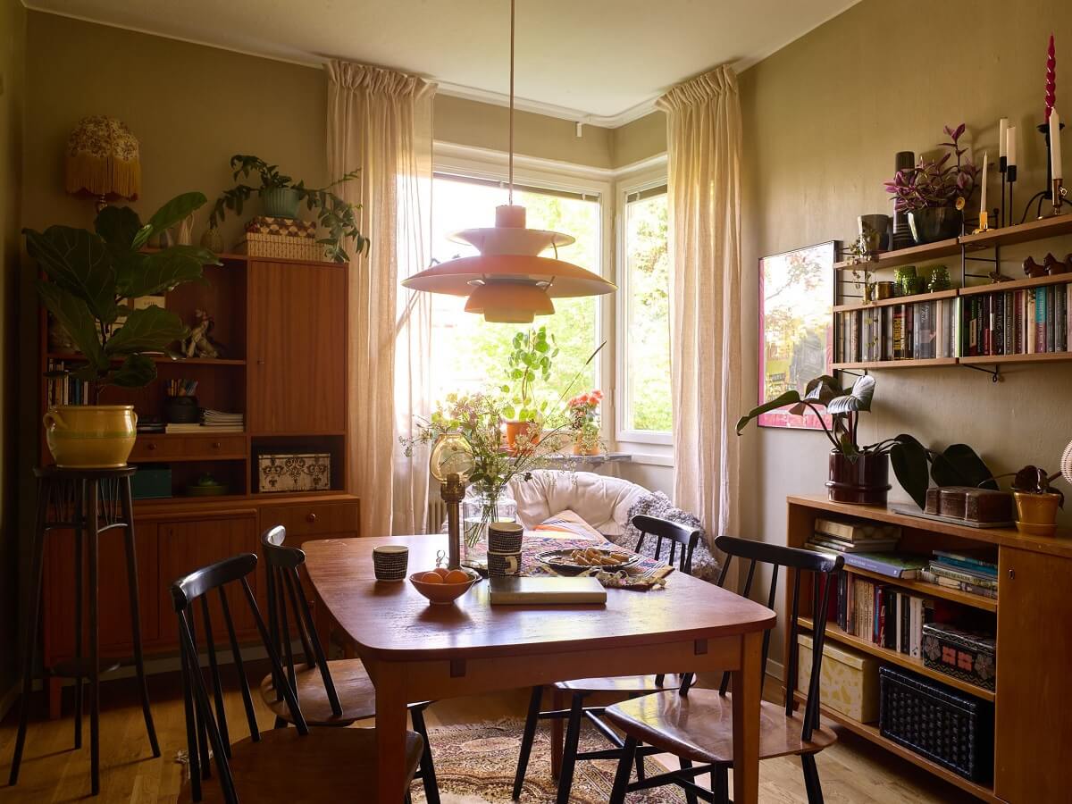 A Charming and Cozy Midcentury Family Apartment in Sweden 16 midcentury furniture dining room nordroom