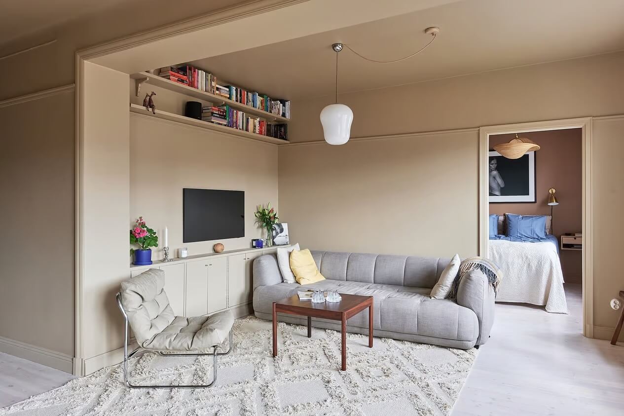 Warm Color-Drenched Rooms in a Swedish Apartment 3 minimalistic beige living room