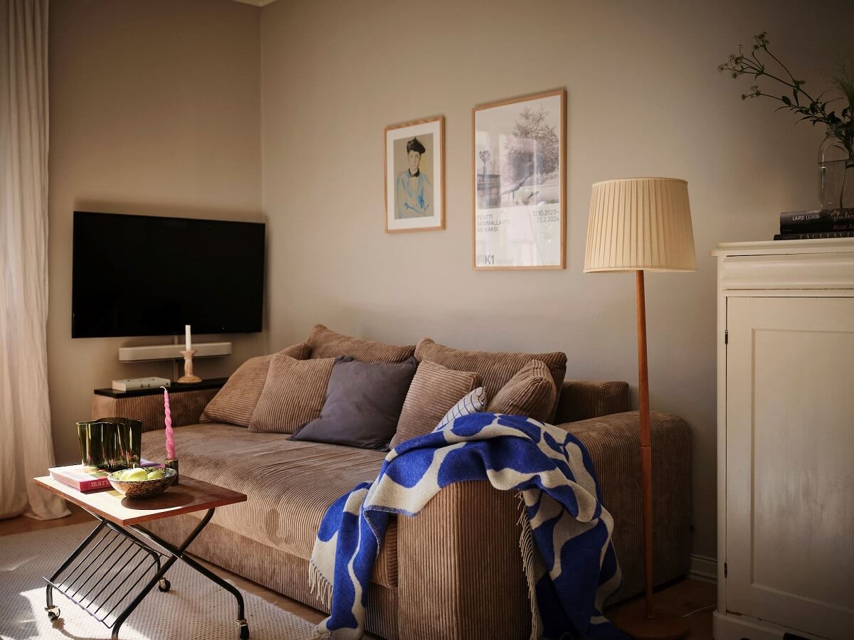 Muted Gray, Green, and Yellow Walls in a Stockholm Apartment 2 muted gray walls living room