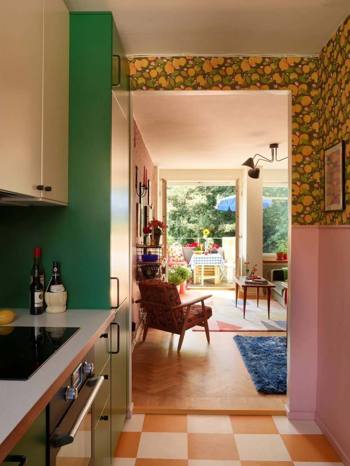A Colorful Swedish Apartment Inspired by the 50s and 70s 6 open plan kitchen and living room