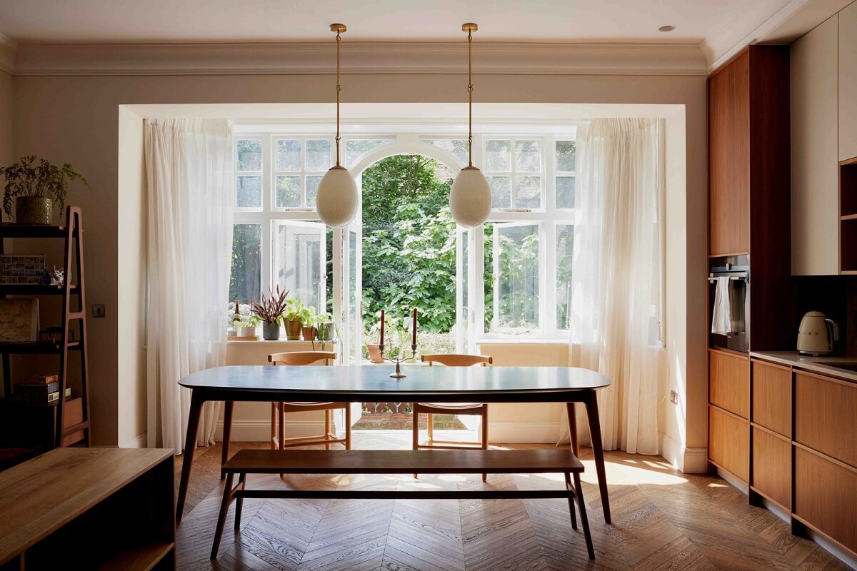 An Apartment with Rich Colors and Modern Design in a Victorian Mansion 2 open plan kitchen dining room