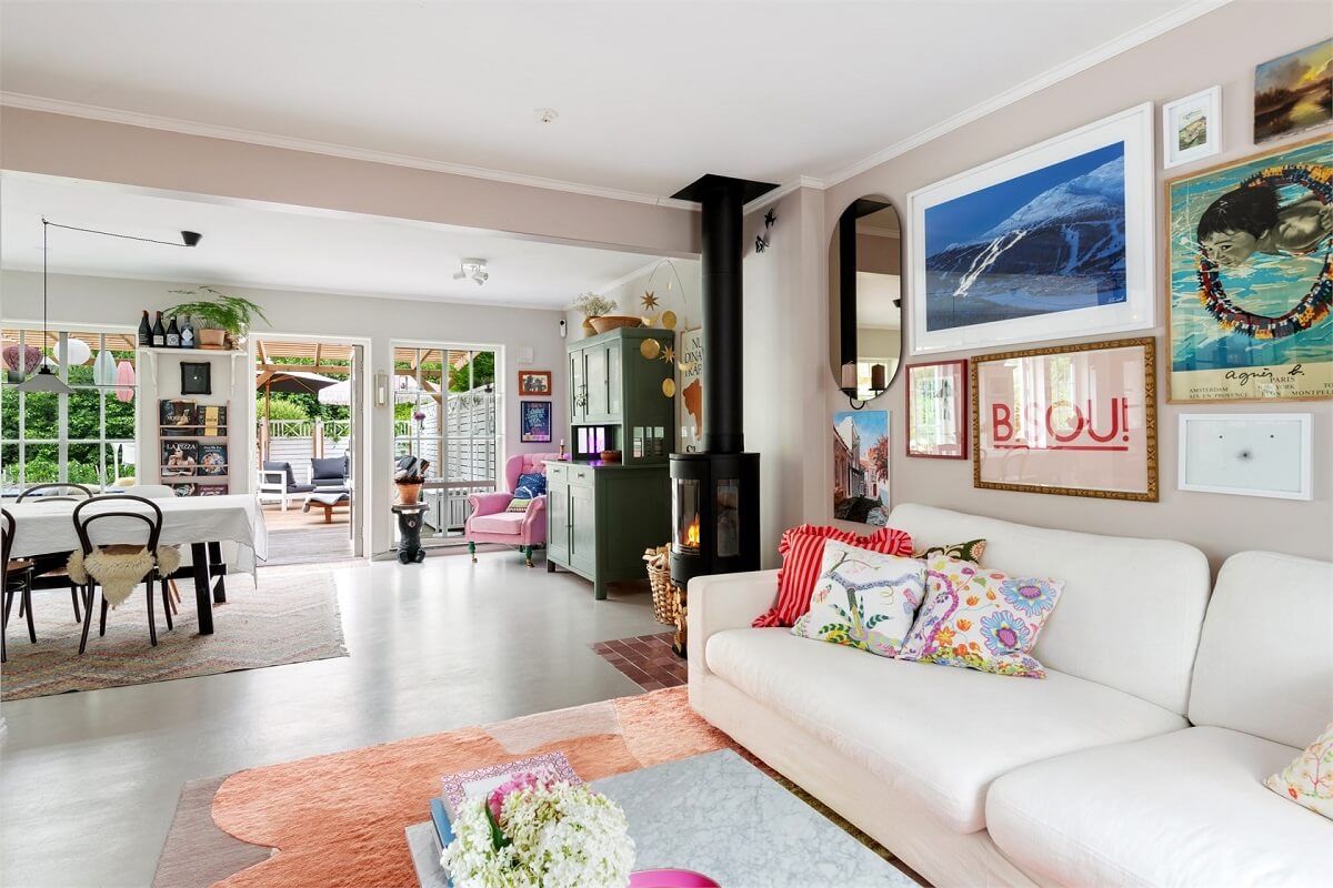 A Bright Open-Plan Swedish Home with a Pink Kitchen 4 open plan living room and dining space