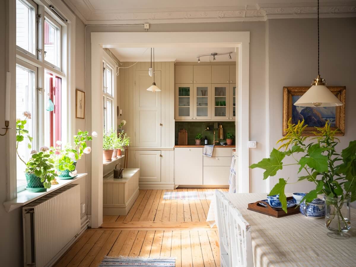 Charming Vintage Country Style in a Family Apartment in Sweden 9 open plan living room and kitchen wooden floor nordroom