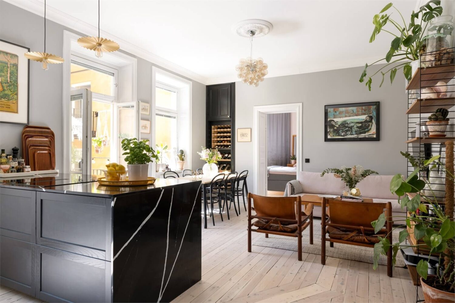A Lovely Stockholm Apartment with a Black Kitchen and Pink Bedroom 13 open plan living space with black kitchen A Lovely Stockholm Apartment with a Black Kitchen and Pink Bedroom