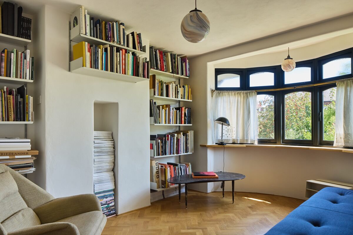Stained Glass Doors and Terrazzo in a London Home 16 reading room with built in shelves and bay window