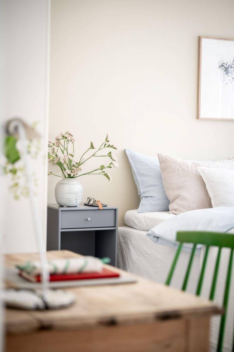 A Bright Swedish Apartment with Subtle Color Accents 18 scandinavian bedroom detail nordroom