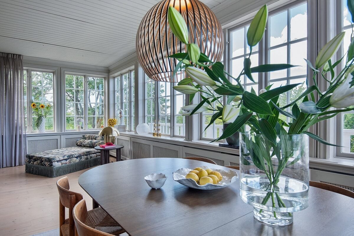 A Yellow Swedish Villa with Views of the Sea 5 scandinavian dining room with chaise longue
