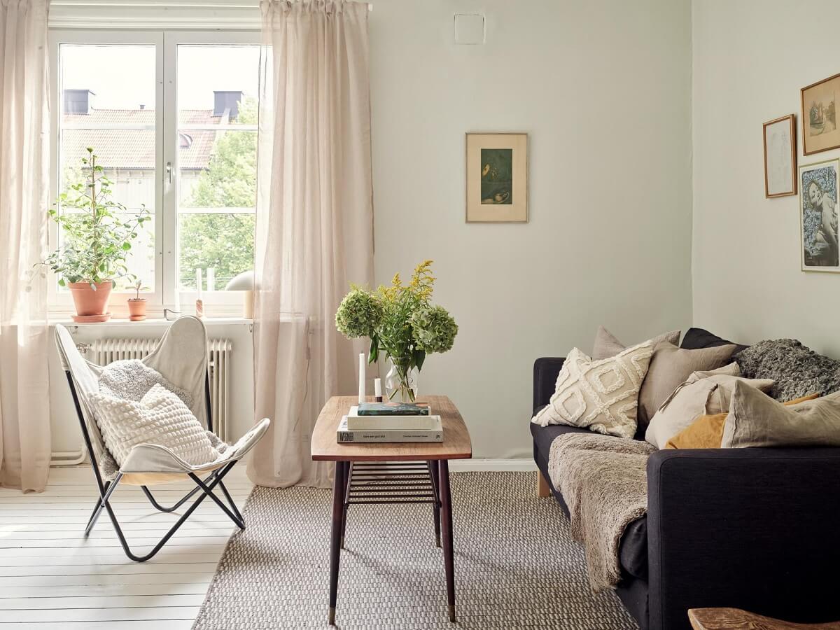 A Small Apartment with a Bright Open-Plan Kitchen & Bedroom 13 scandinavian living room