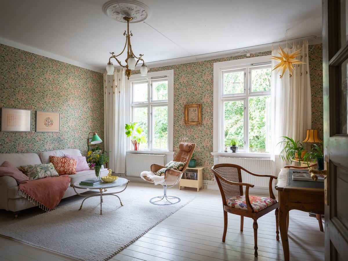 Charming Vintage Country Style in a Family Apartment in Sweden 2 scandinavian living room with large windows and wallpaper nordroom