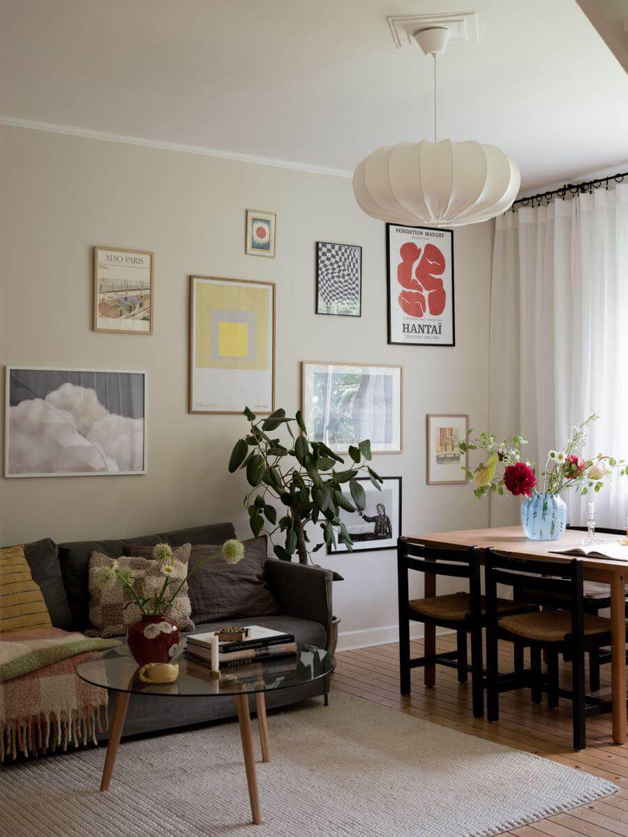 scandinavian living room with light gray walls and art