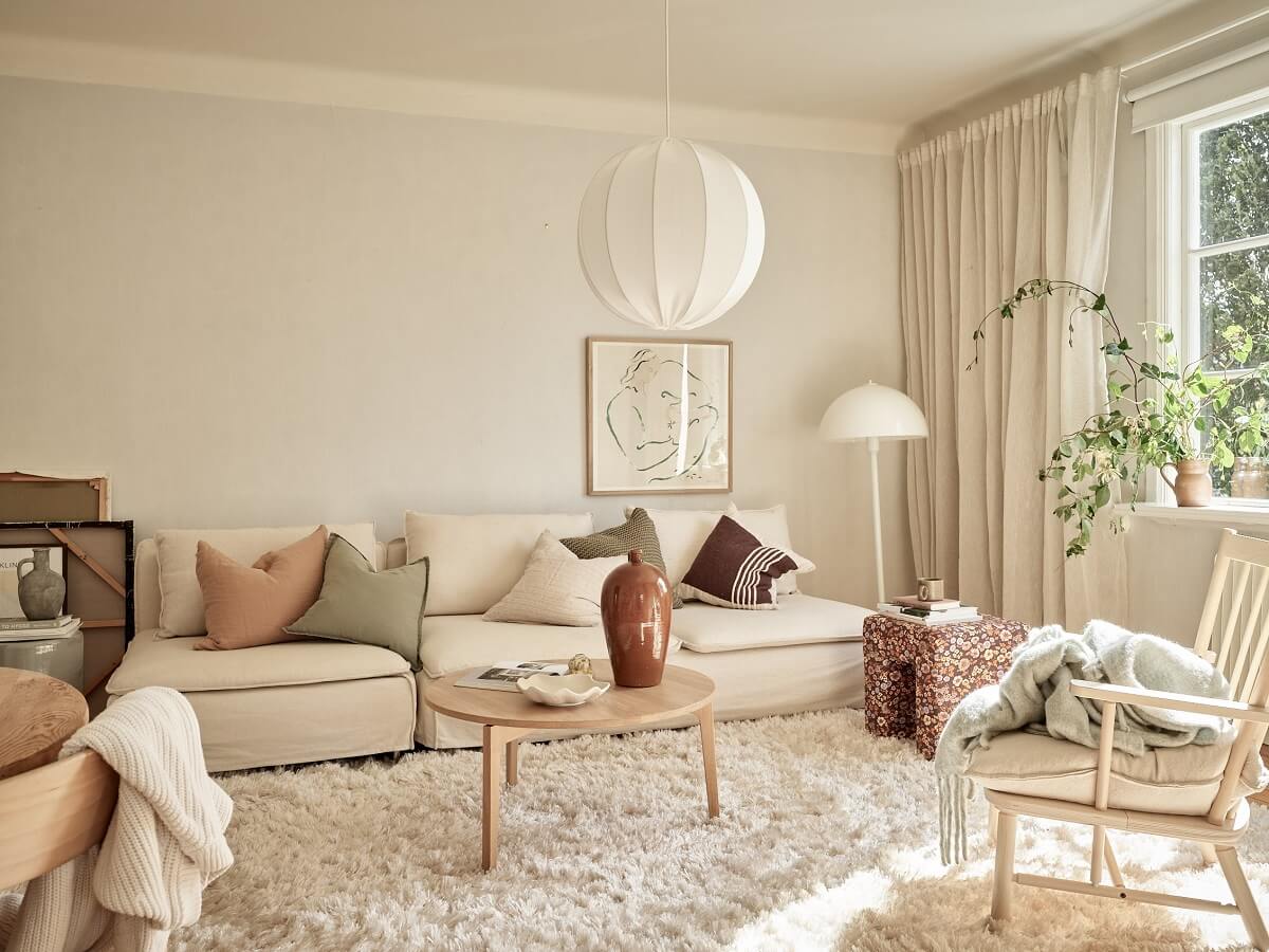 A Light Swedish Apartment with a Charming Kitchen 2 serene light colored living room
