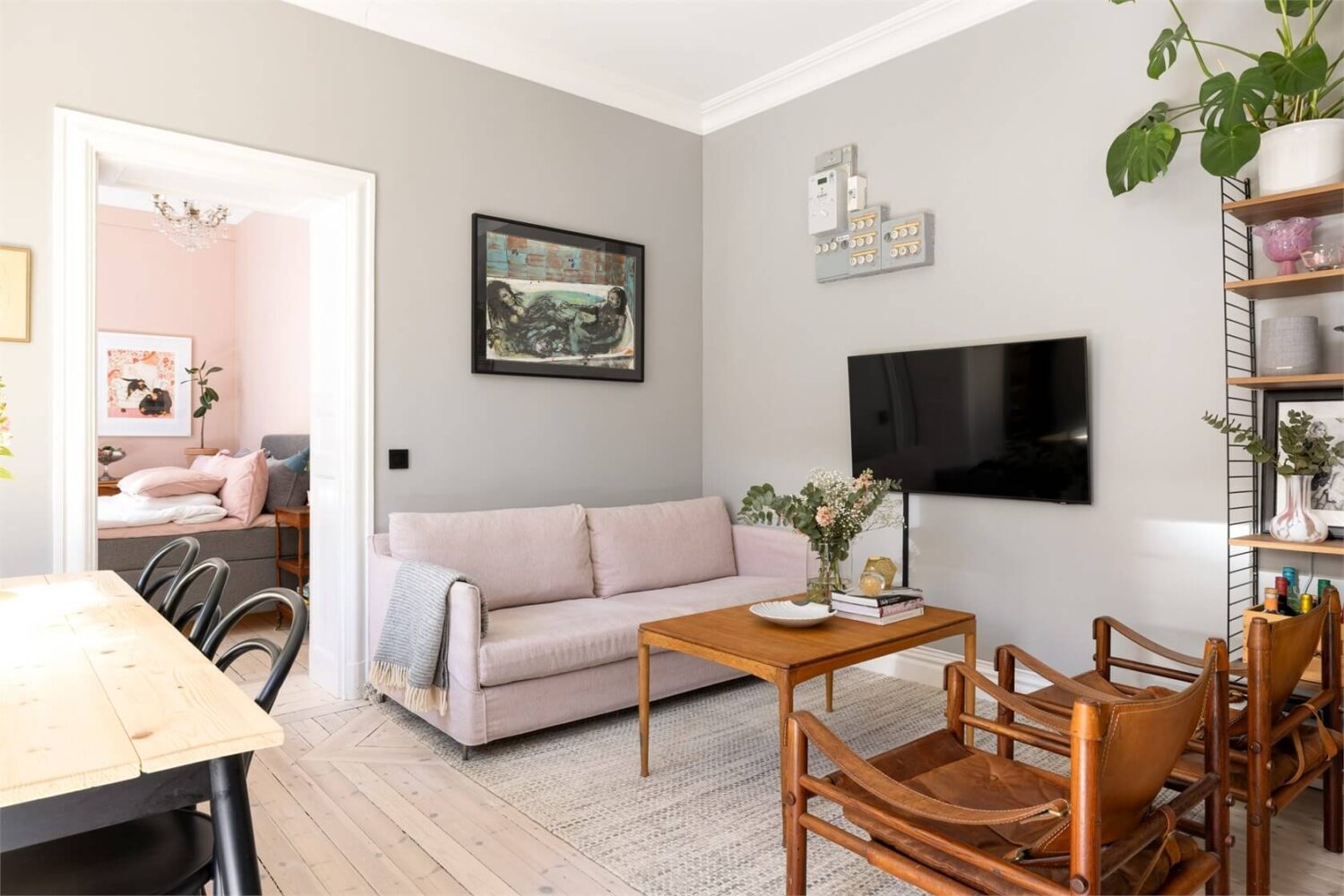 A Lovely Stockholm Apartment with a Black Kitchen and Pink Bedroom 15 sitting room with gray walls