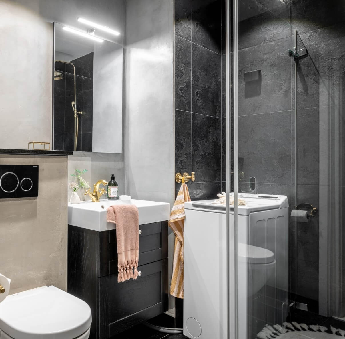 A Scandinavian Apartment with a Pale Yellow Living Room 20 small bathroom black tiles