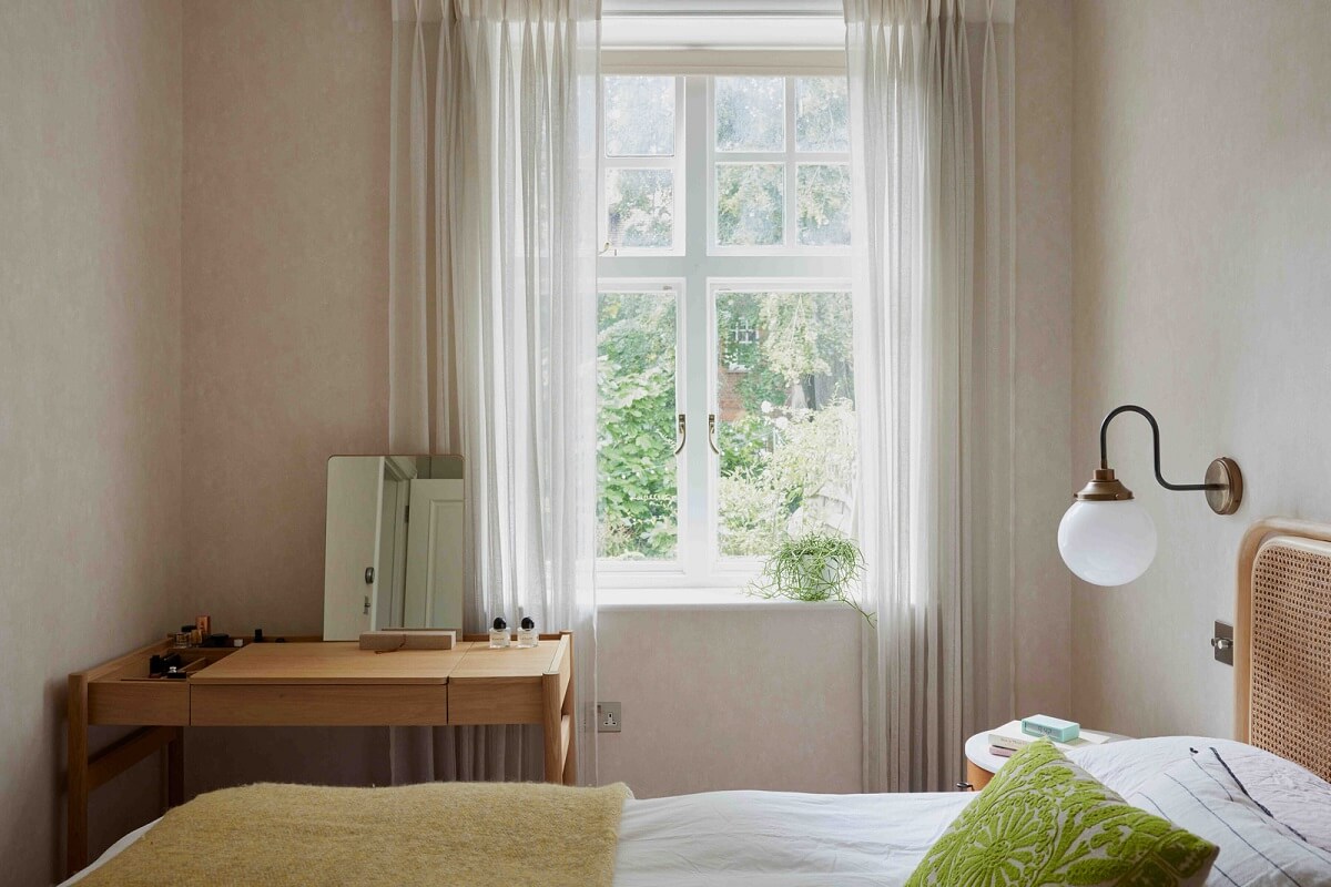 An Apartment with Rich Colors and Modern Design in a Victorian Mansion 11 small bedroom with vanity table