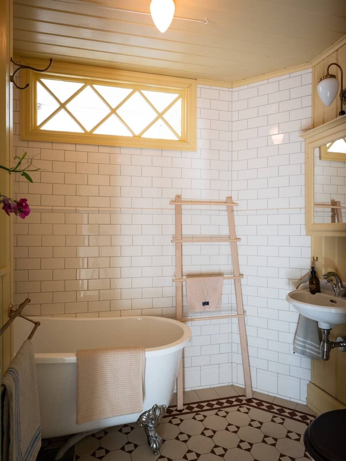 Charming Vintage Country Style in a Family Apartment in Sweden 31 small classic bathroom with clawfoot bath nordroom