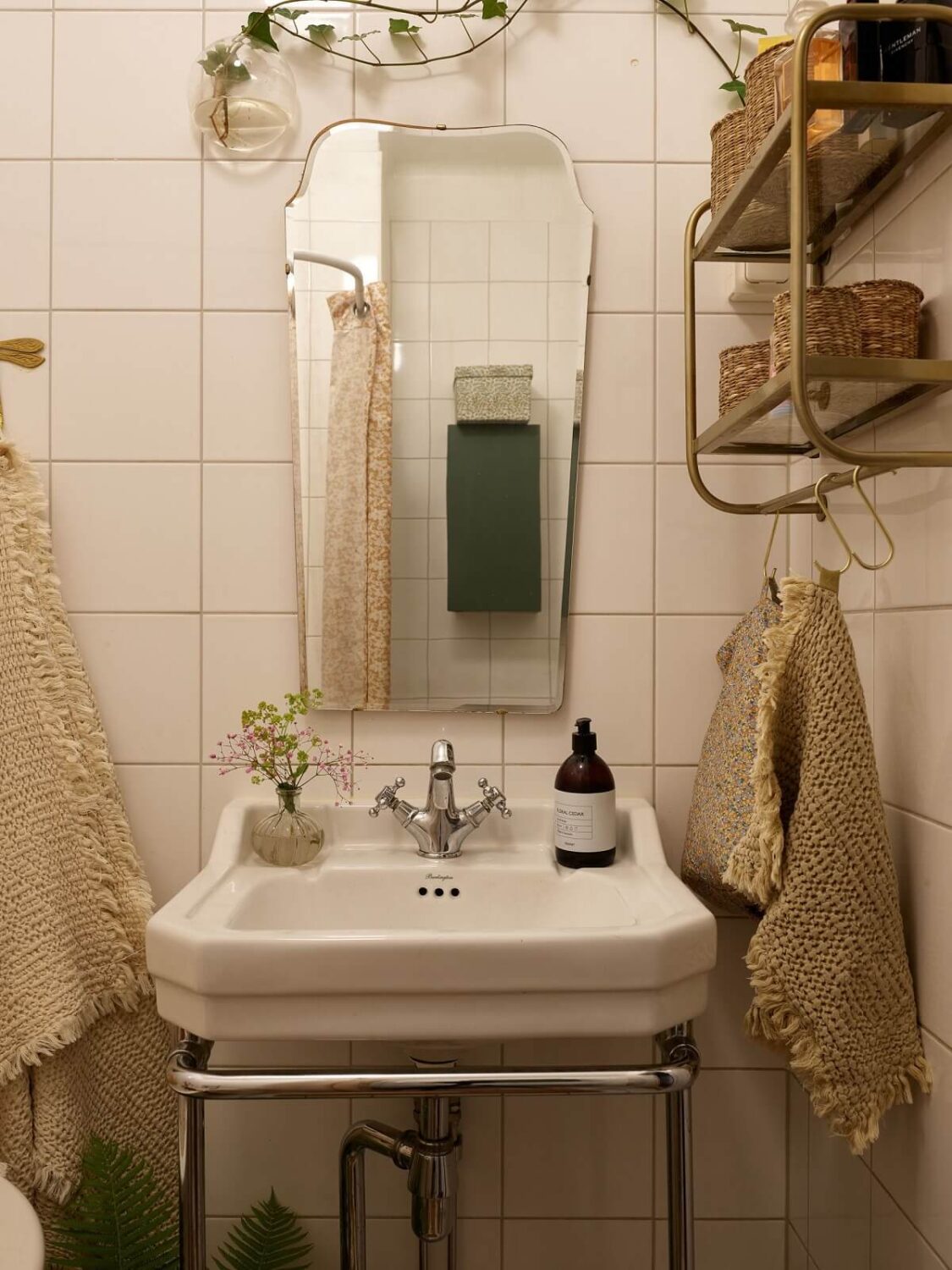 A Cozy 1920s Apartment with Original Details and Wallpaper 29 small white bathroom