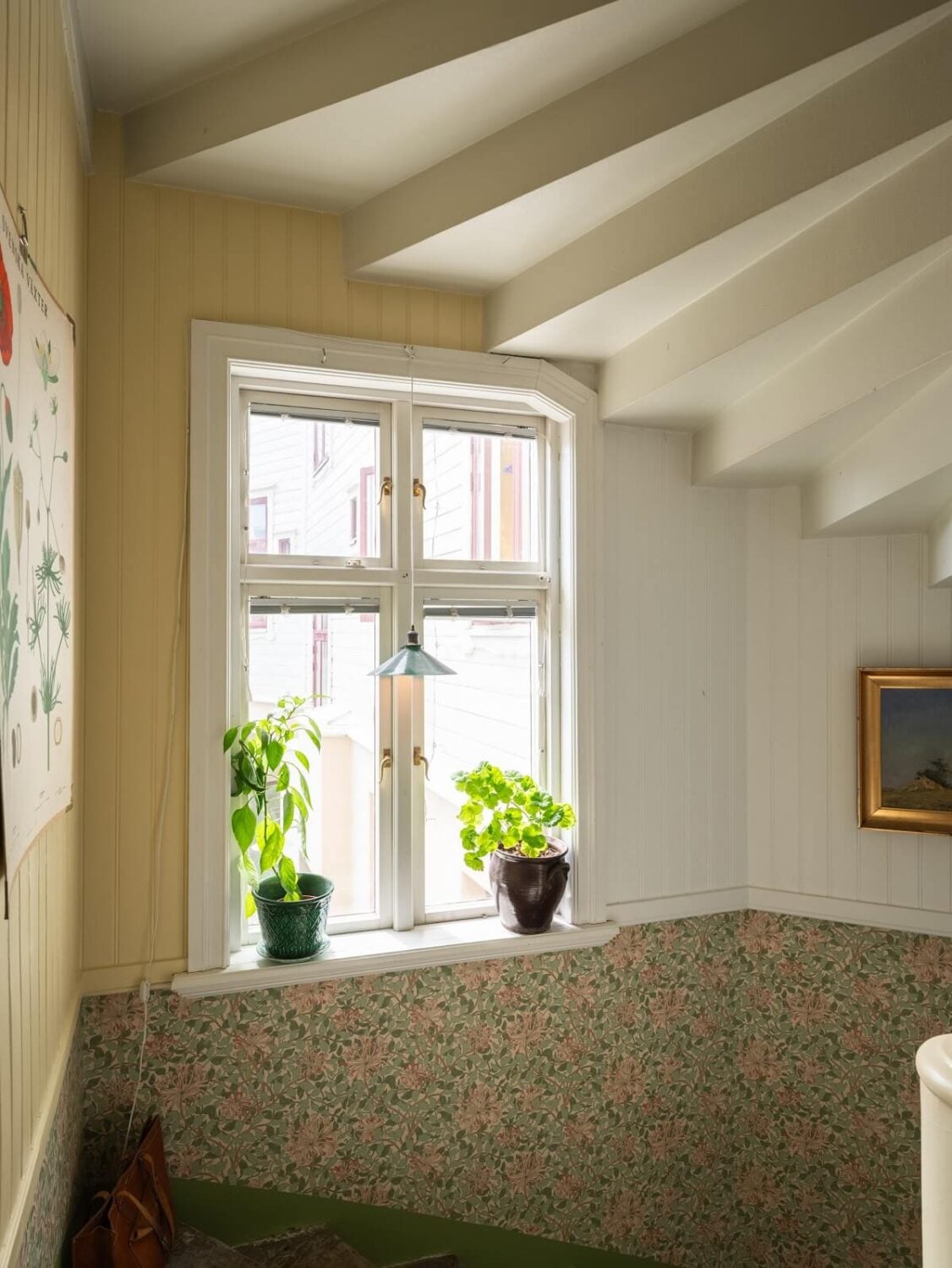 Charming Vintage Country Style in a Family Apartment in Sweden 33 staircase with wallpaper