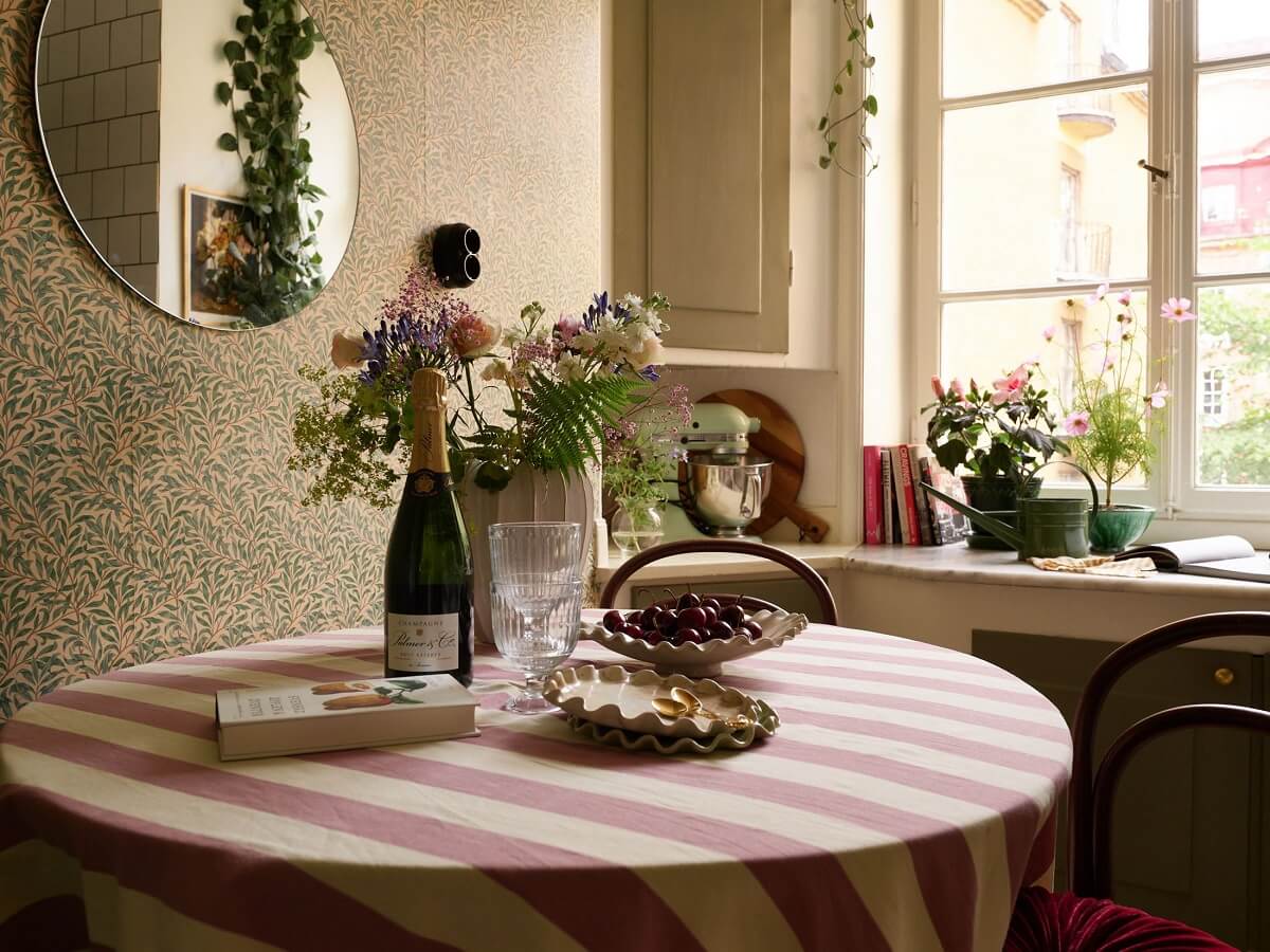 A Cozy 1920s Apartment with Original Details and Wallpaper 14 striped table cloth