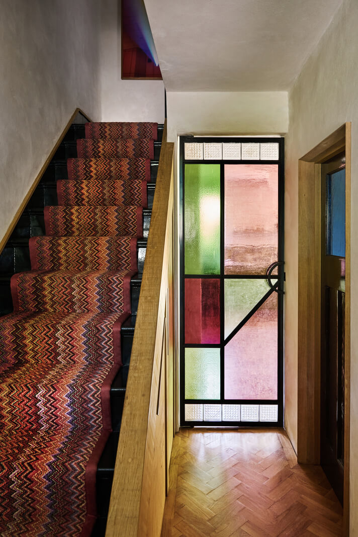 Stained Glass Doors and Terrazzo in a London Home 11 technicolor carpet runner