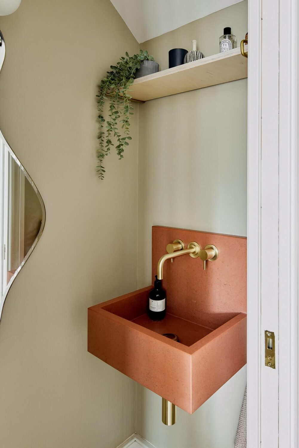 Light and Modern Spaces in an Award-Winning London House 13 terracotta colored sink