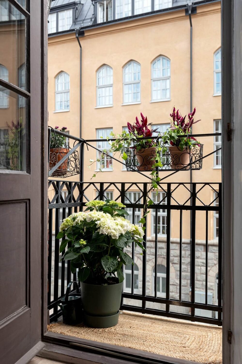 A Classic Apartment with a Blue Living Room 8 tiny balcony