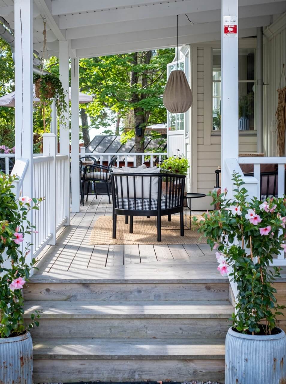 A White Swedish Villa with a Veranda and a Swimming Pool 32 veranda detail