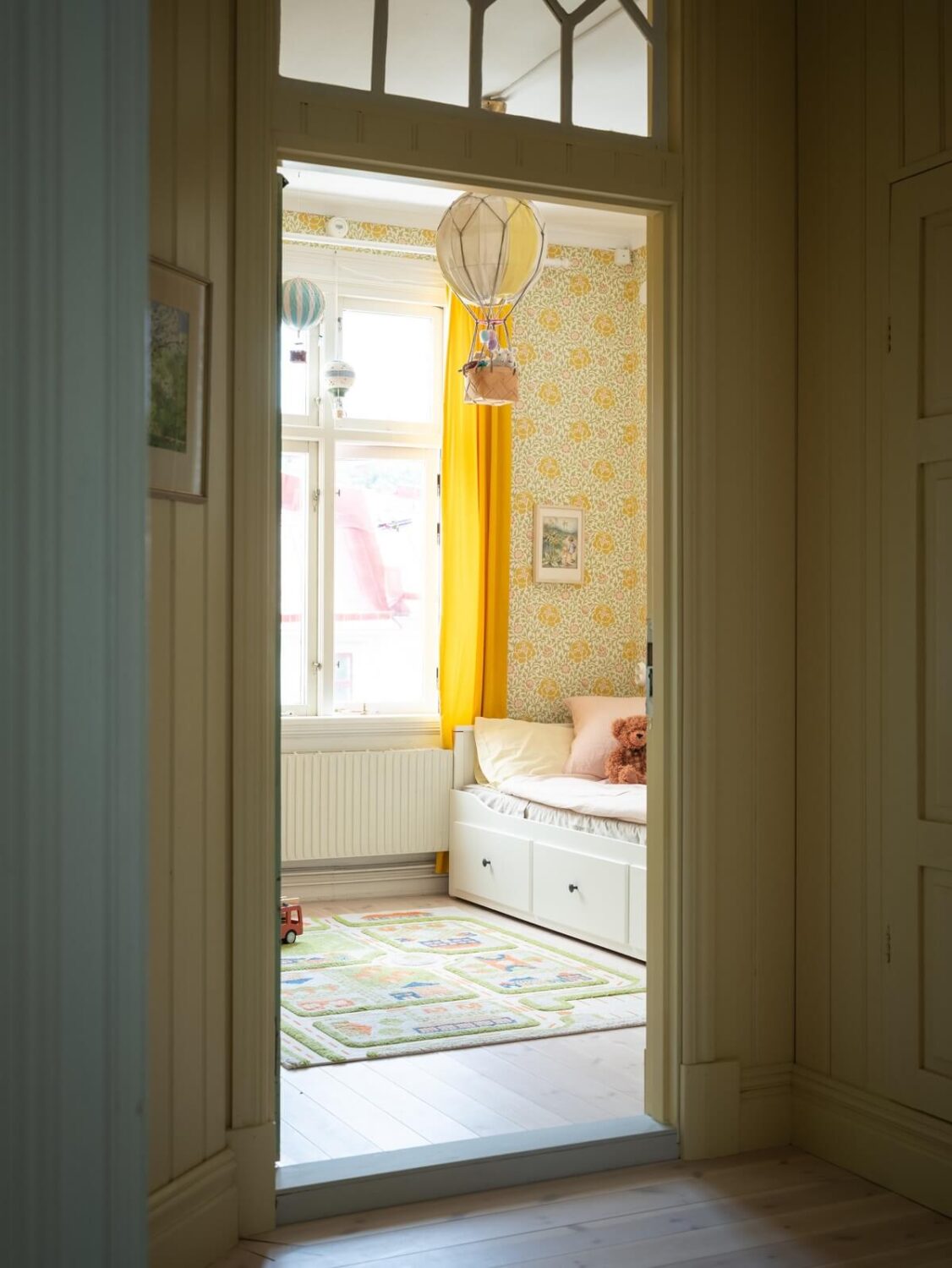 Charming Vintage Country Style in a Family Apartment in Sweden 21 view into kids bedroom