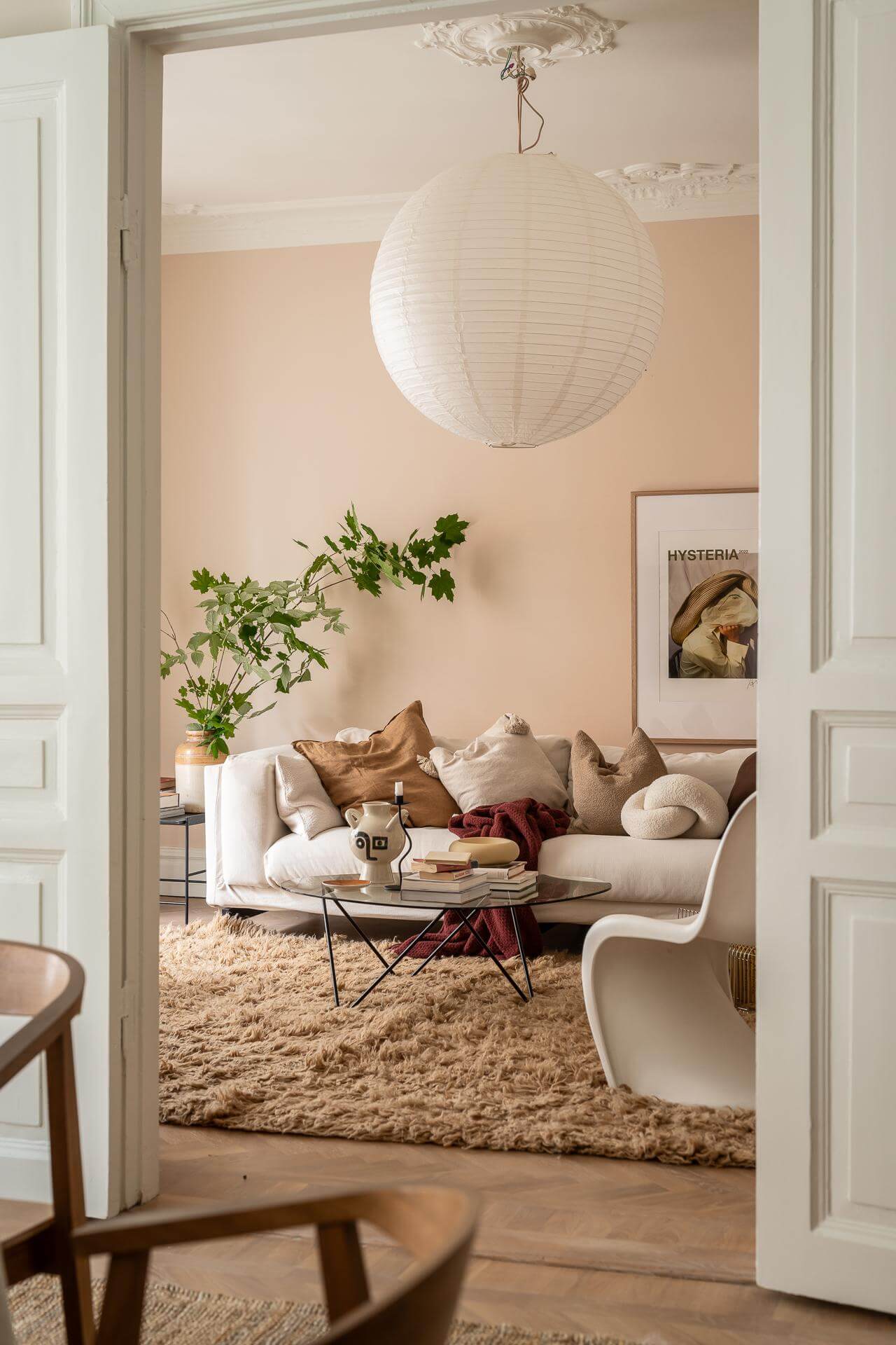 view into living room with beige pink walls