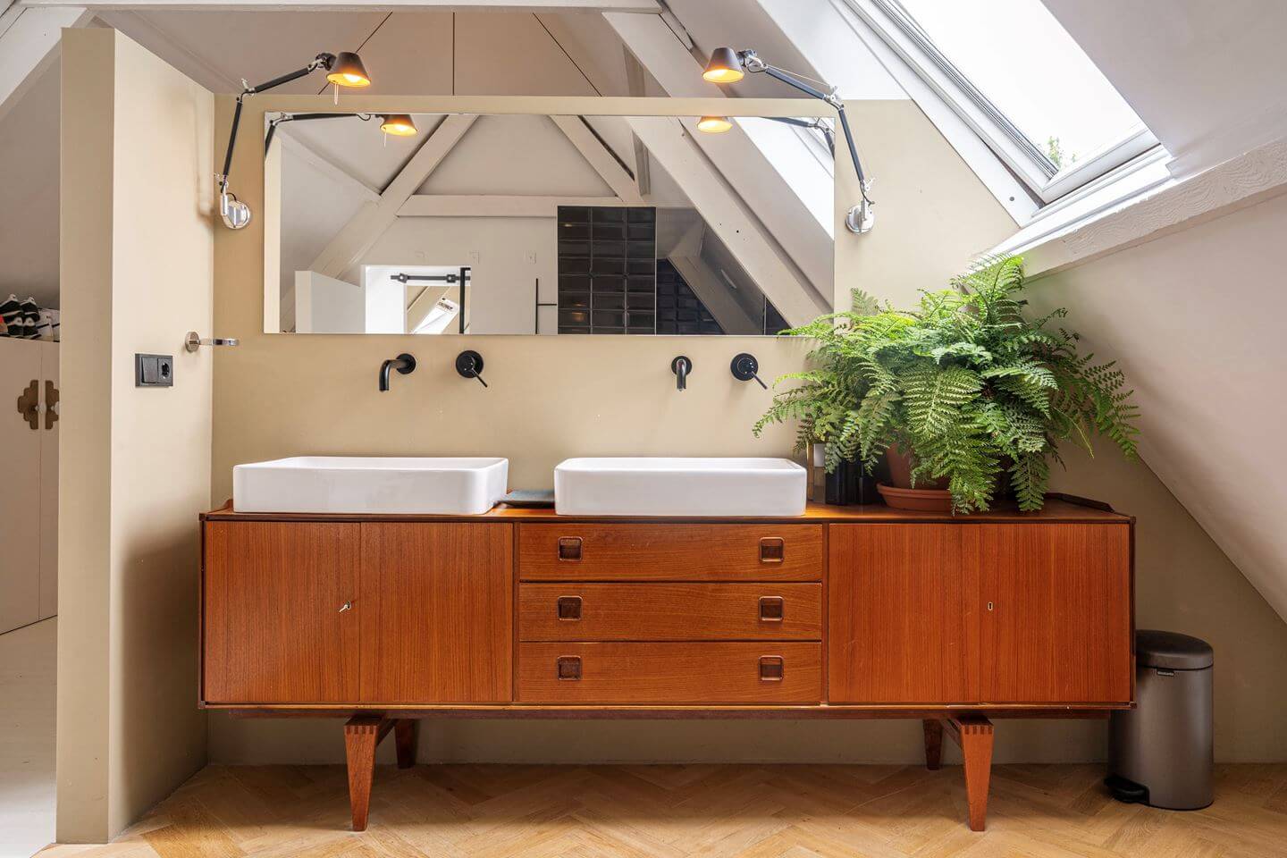 An Old Smokehouse Transformed Into a Modern Industrial Home 23 vintage cabinet double sinks