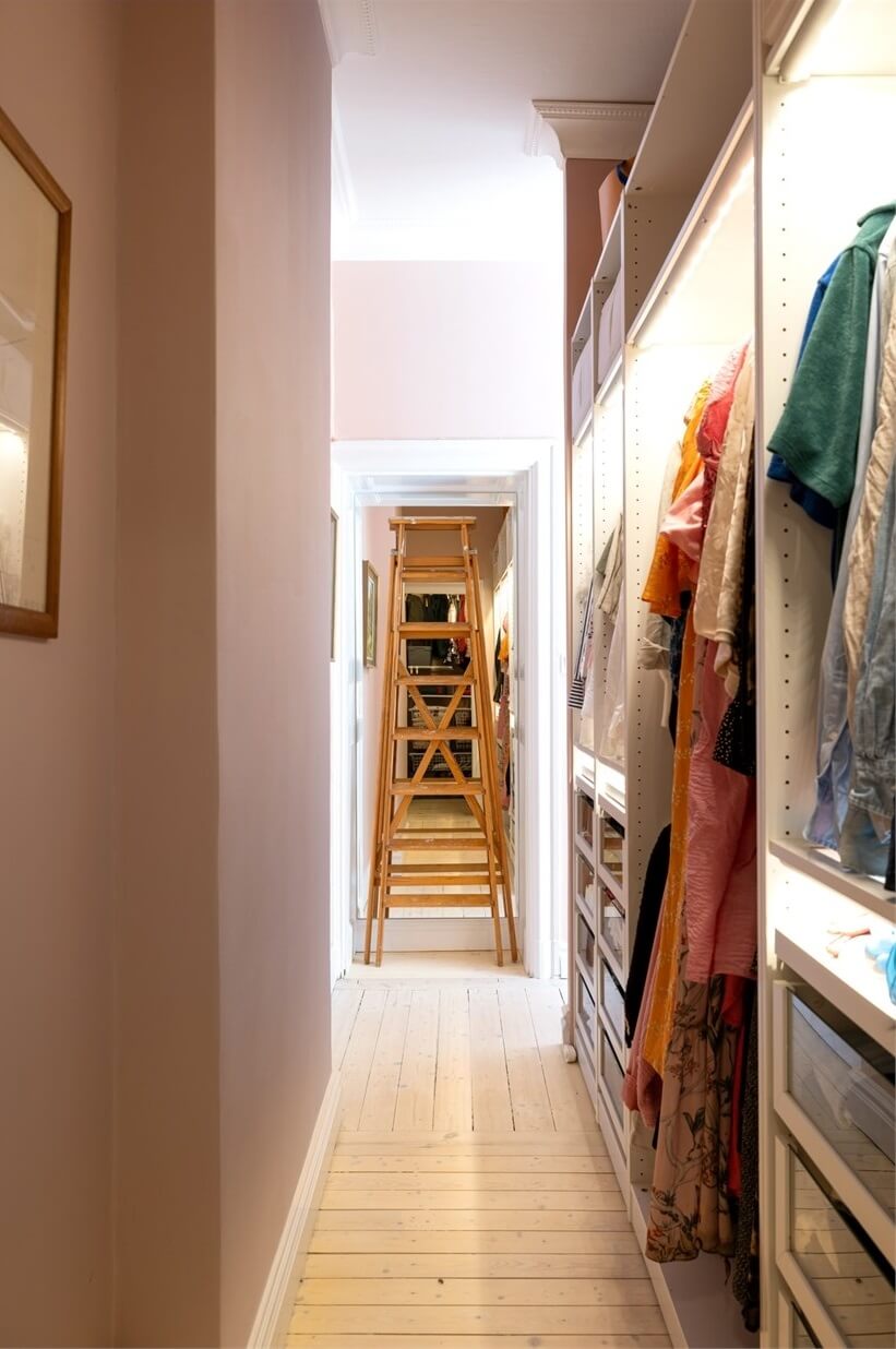 A Lovely Stockholm Apartment with a Black Kitchen and Pink Bedroom 23 walk in closet