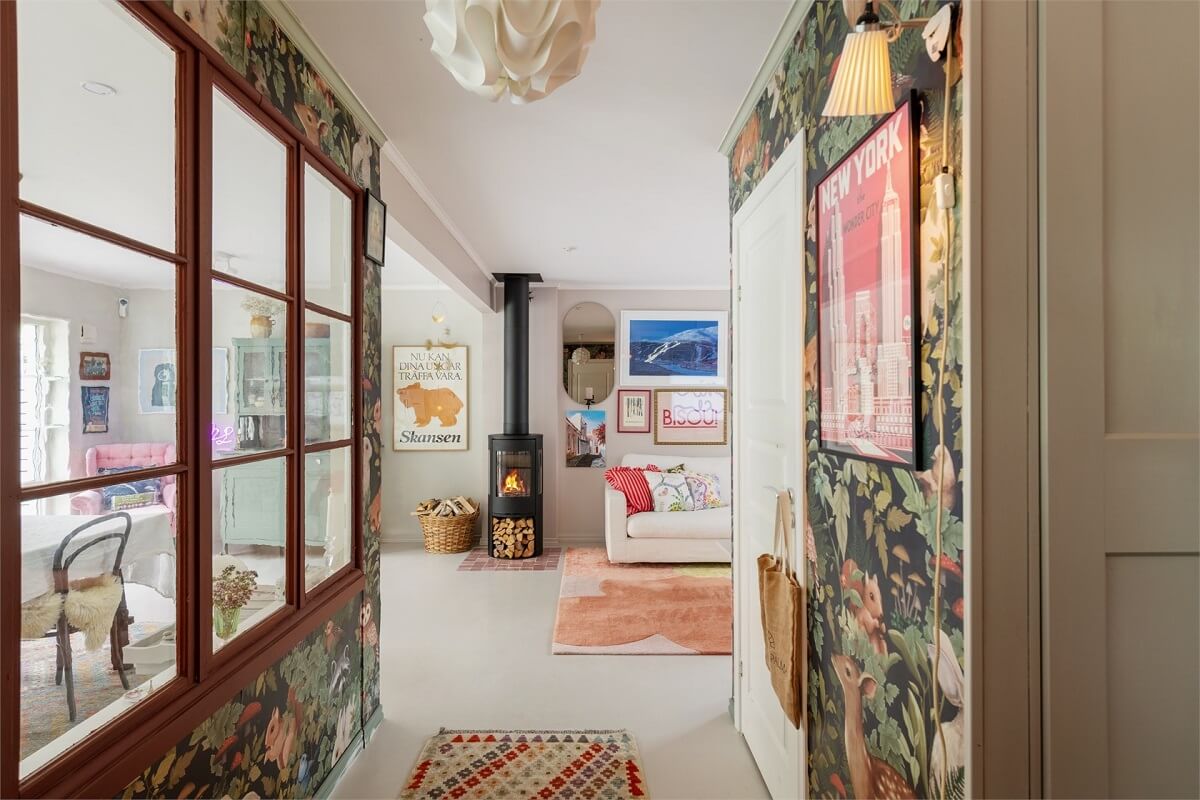 A Bright Open-Plan Swedish Home with a Pink Kitchen 16 wallpaper hallway and wall with window