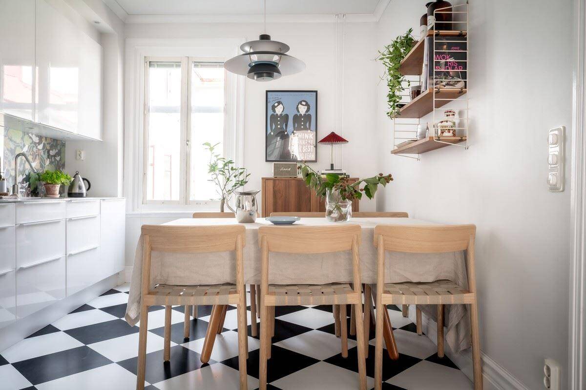 A Bright Swedish Apartment with Subtle Color Accents 12 white kitchen dining table