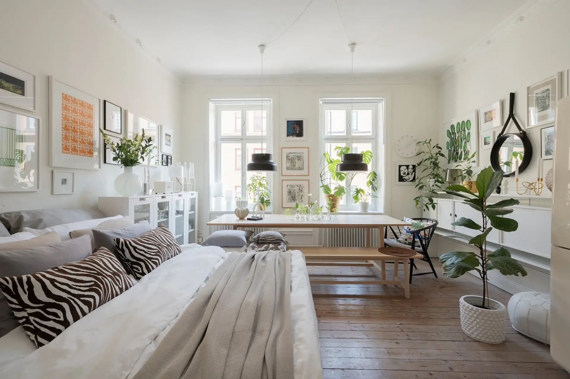 white studio apartment with large table