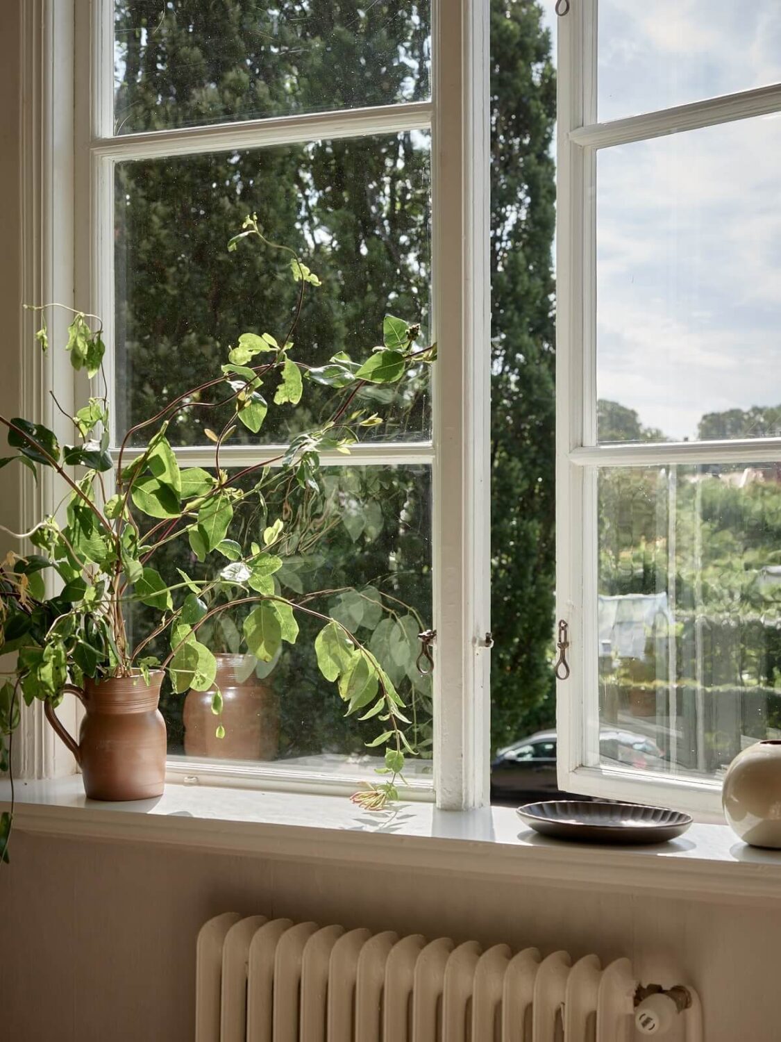 A Light Swedish Apartment with a Charming Kitchen 17 window detail