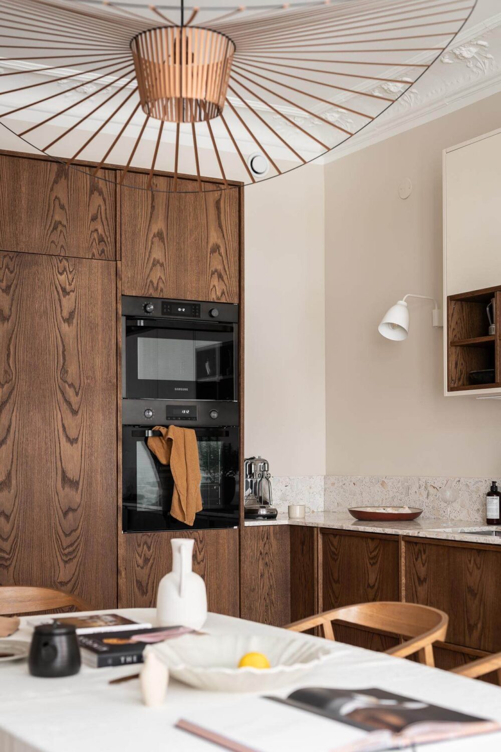 A Spacious Renovated Apartment with a Light Pink Living Room 13 wooden kitchen