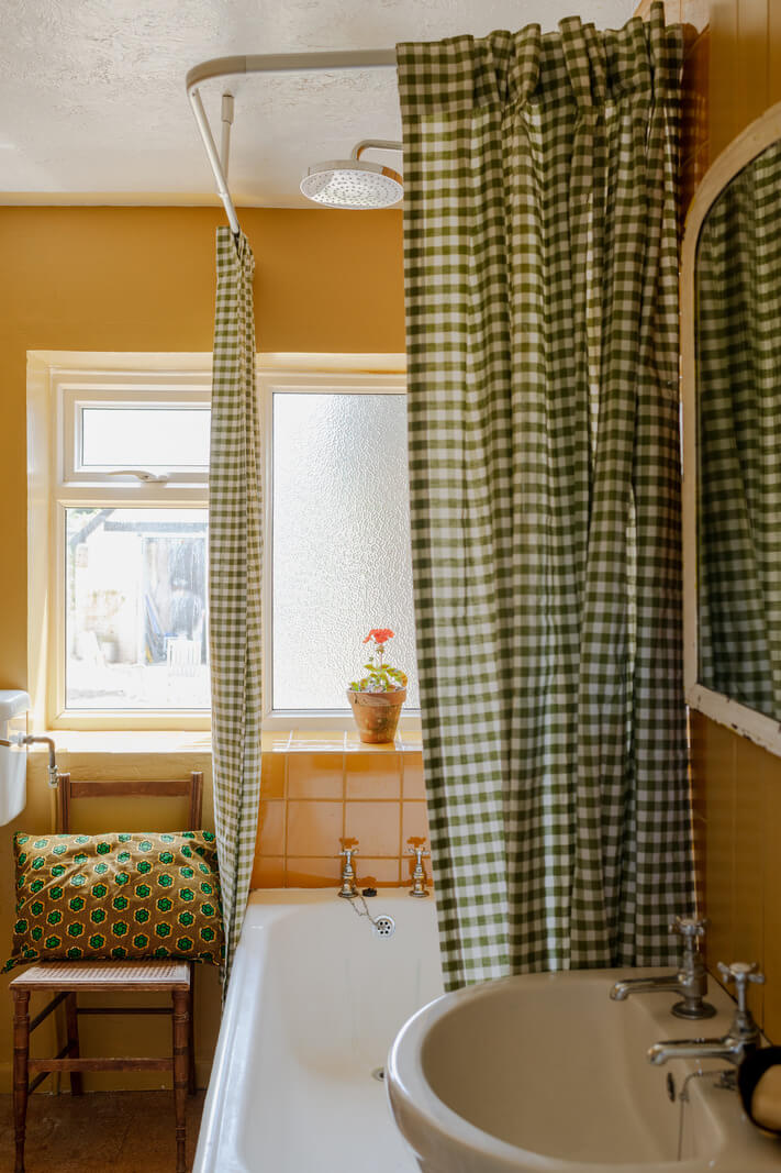 A Charming English Cottage with Historic Details 11 yellow bathroom A Charming English Cottage with Historic Details