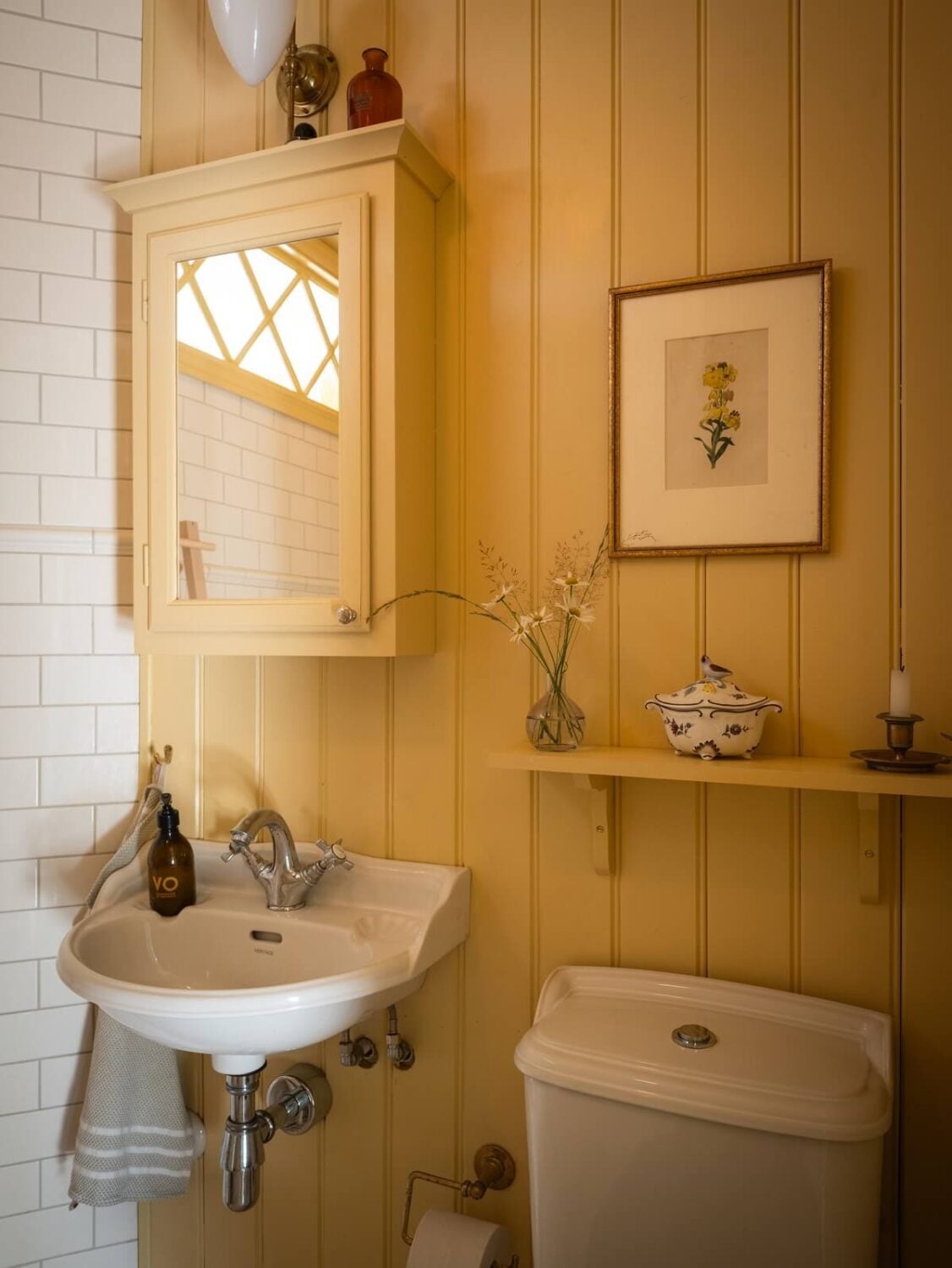 Charming Vintage Country Style in a Family Apartment in Sweden 32 yellow tongue and groove paneled walls bathroom nordroom