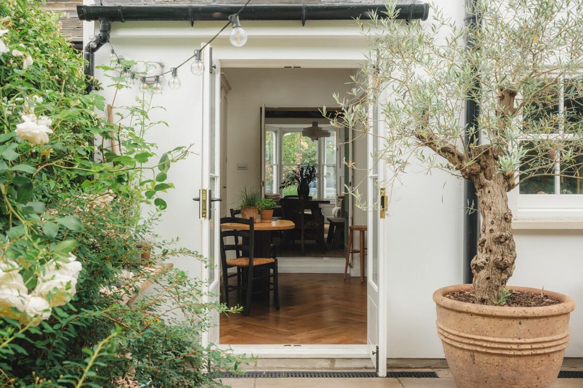 A Soft and Natural Color Palette in a Victorian Home 8 back garden view into kitchen