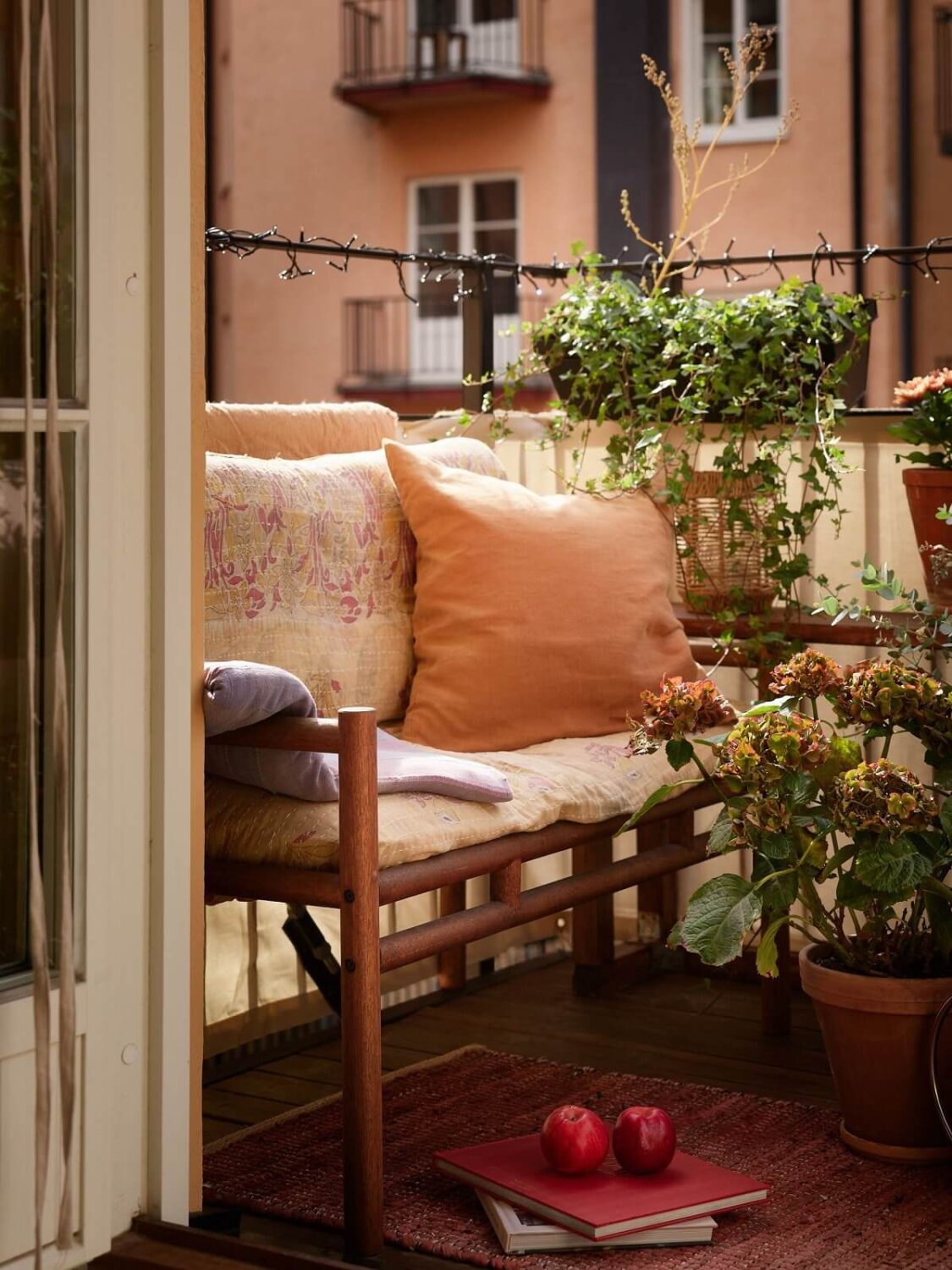 A Studio Apartment with Plaster Walls and a Walnut Kitchen 6 balcony seating
