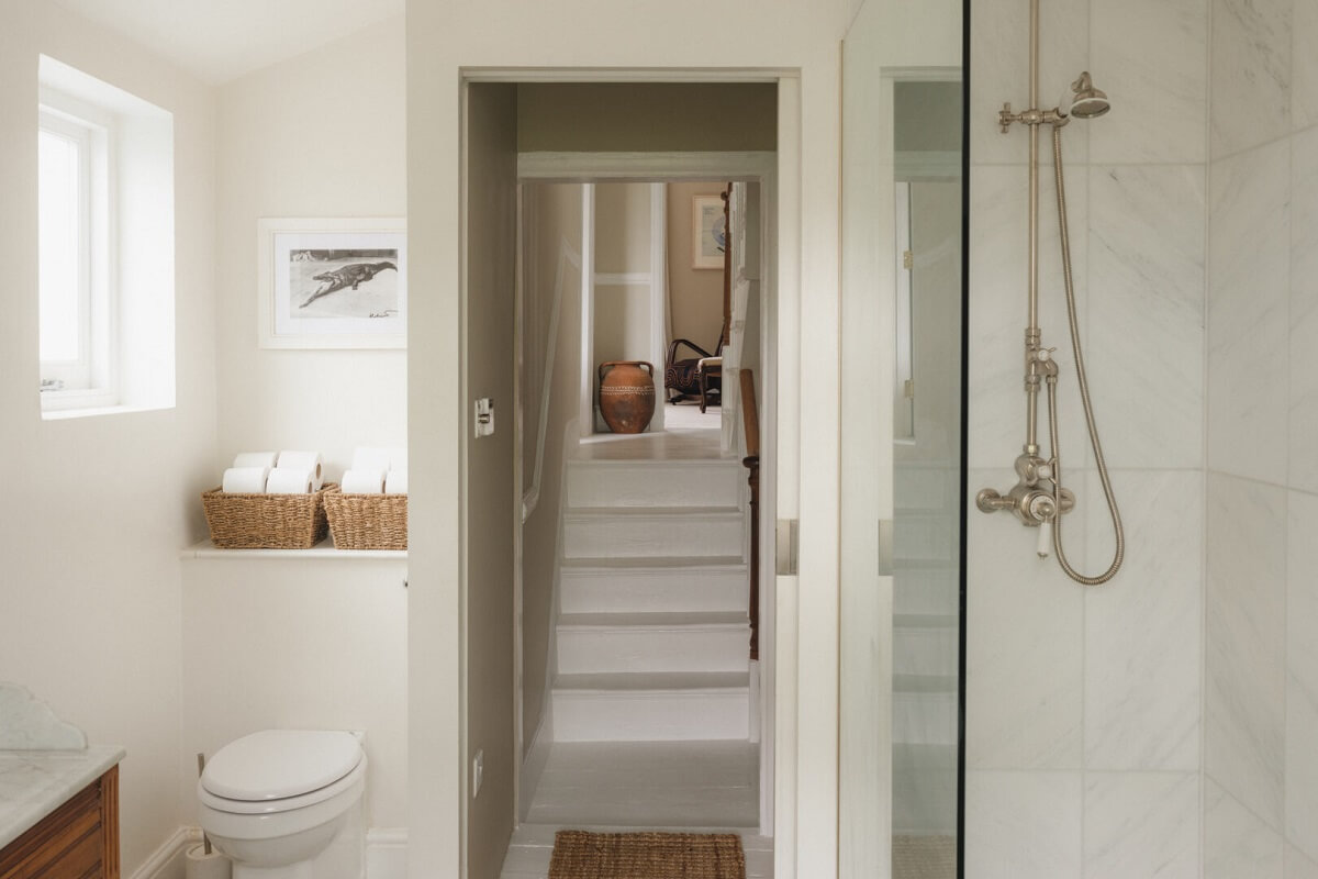 A Soft and Natural Color Palette in a Victorian Home 16 bathroom with walk in shower