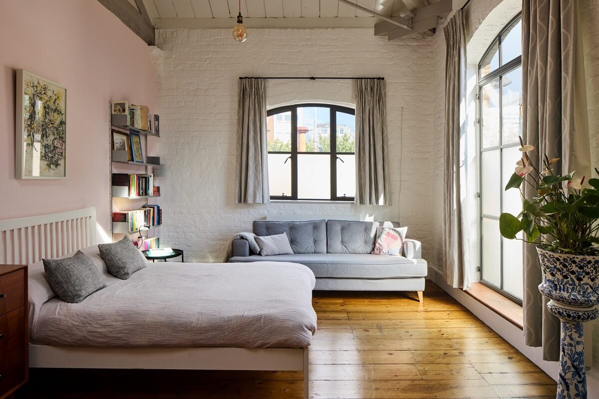 An Industrial and Colorful Warehouse Conversion in London 17 bedroom large windows wooden floor