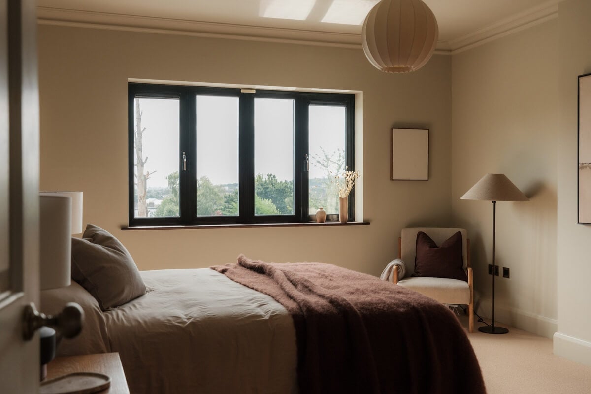 A Calm Color Palette and Warm Materials in a London Home 21 bedroom light gray walls