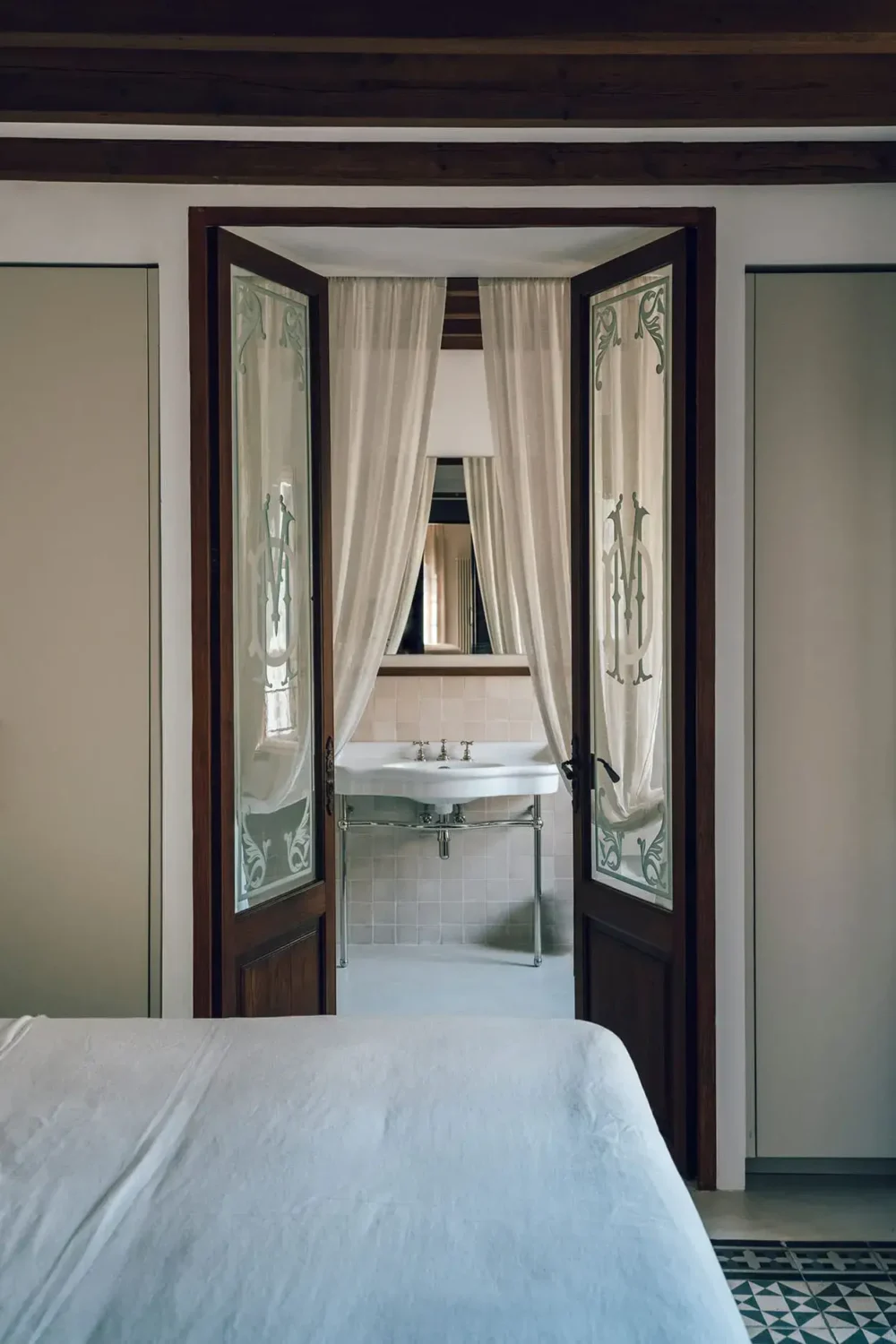 Beautiful Period Features in an Early 20th-Century Majorcan Townhouse 13 bedroom with dark wood and en suite bathroom