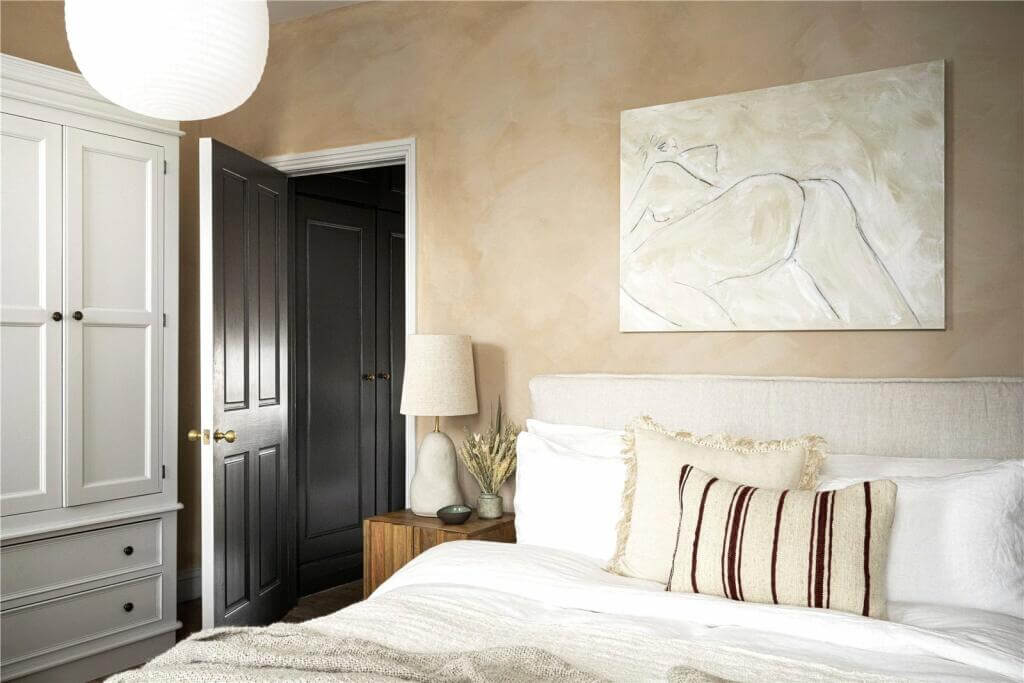 A Stylish Two Bedroom Maisonette in London 9 bedroom with light pink plaster walls