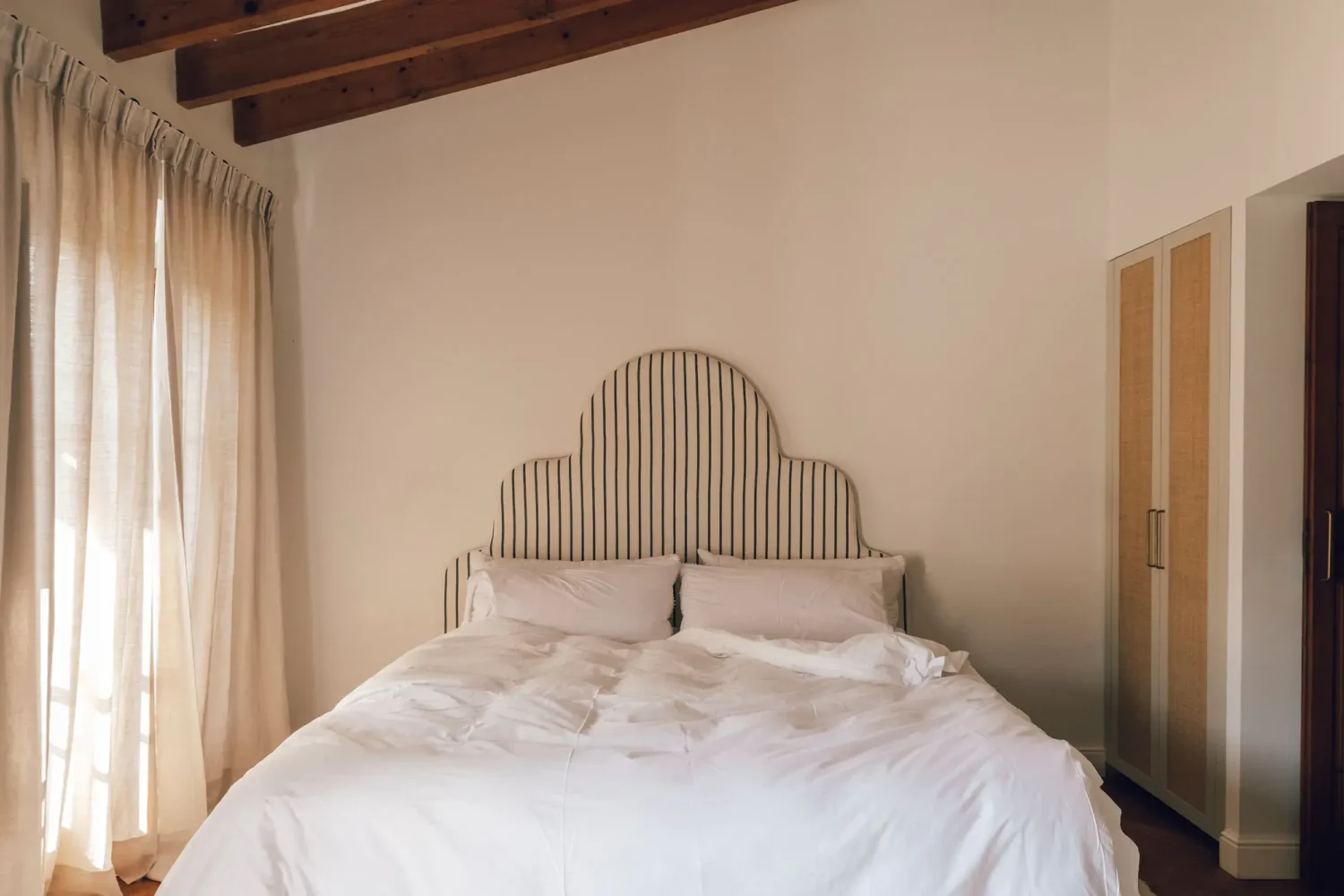 Beautiful Period Features in an Early 20th-Century Majorcan Townhouse 12 bedroom with slanted ceiling with wooden beams