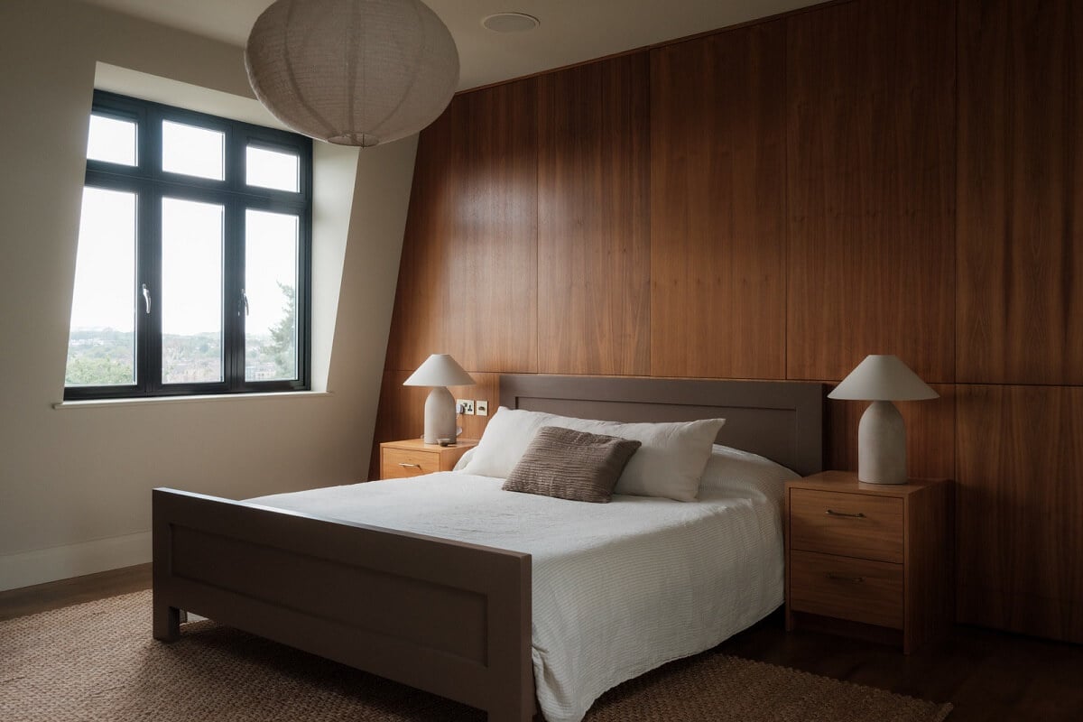 A Calm Color Palette and Warm Materials in a London Home 23 bedroom wooden accent wall