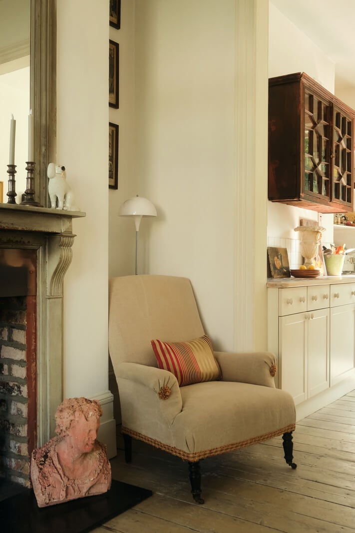 A One-Bedroom Maisonette with a Garden in London 4 beige armchair
