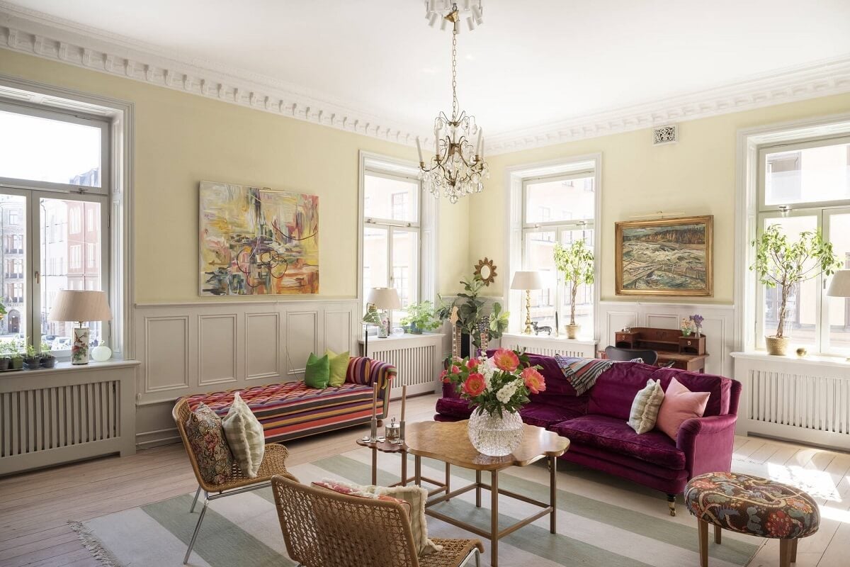 Bright, Spacious Rooms in a Classic Stockholm Apartment 4 beige living room with colorful furniture